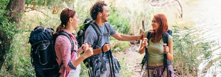 Hikers talking together on a trail