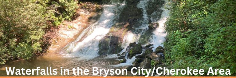Three streams of a waterfall sliding down into a large pool